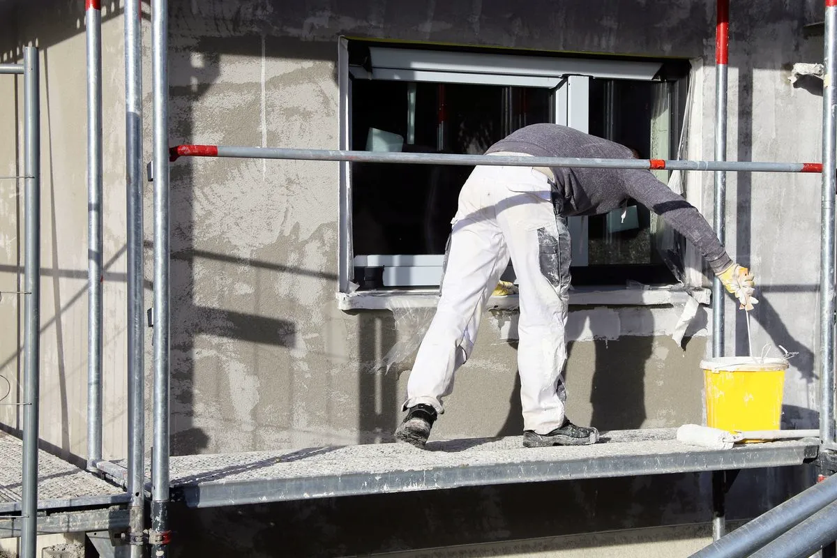 Stucco repair and painting Bexar County TX - elastomeric coating application